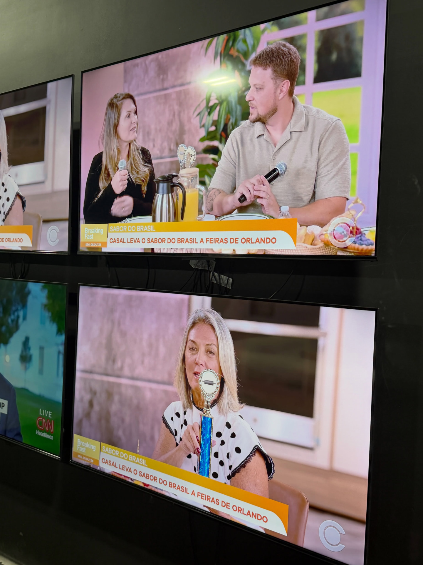 Television screens showing the interview about Brazilian flavors in Orlando