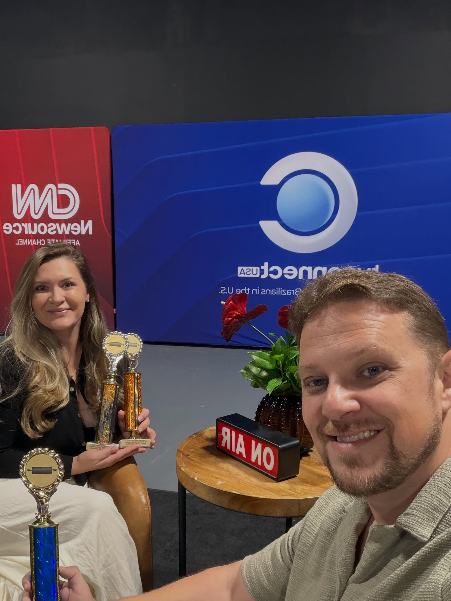 Caio and Elis with trophies at the TVConnect USA studio